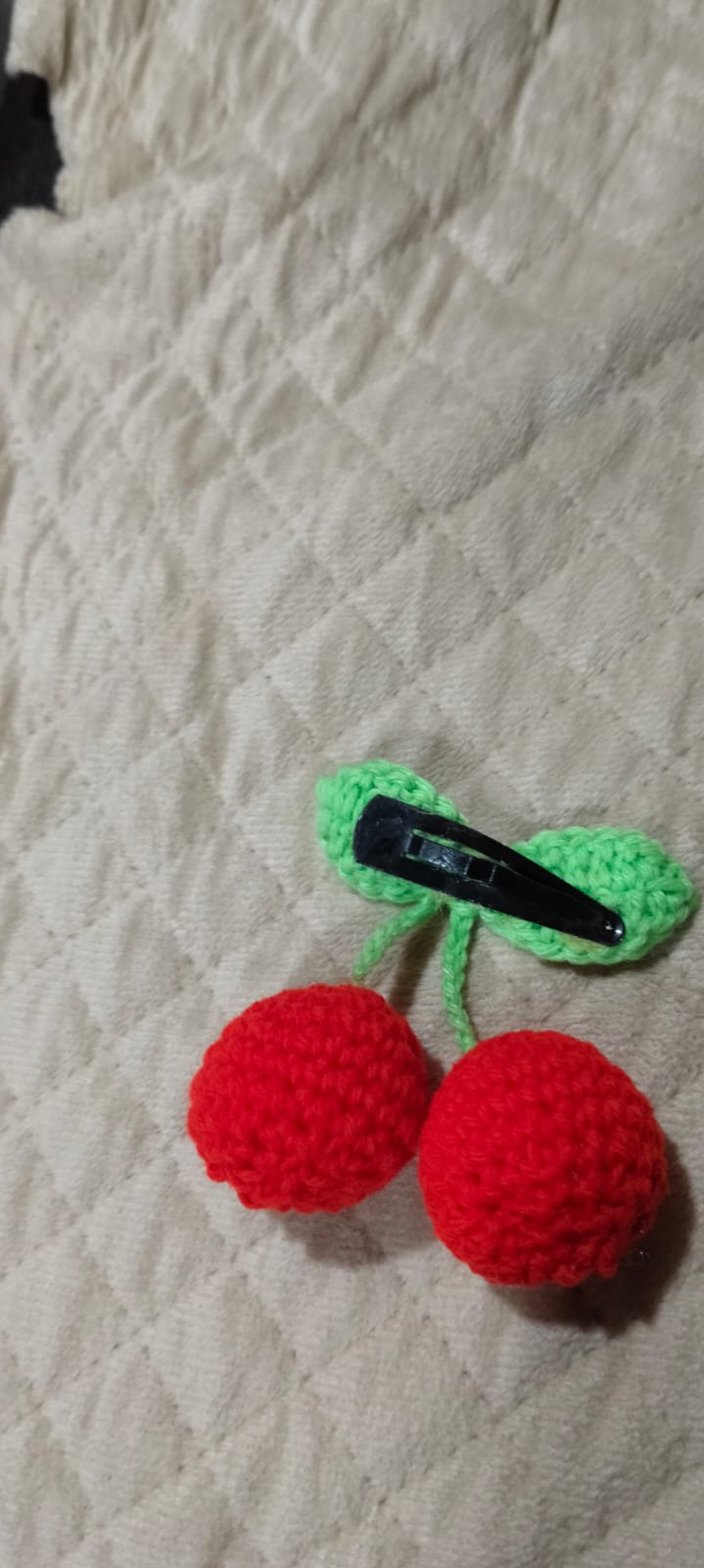Frog Twins — a pair of bright green crocheted frog keychains with googly eyes and red tongues
