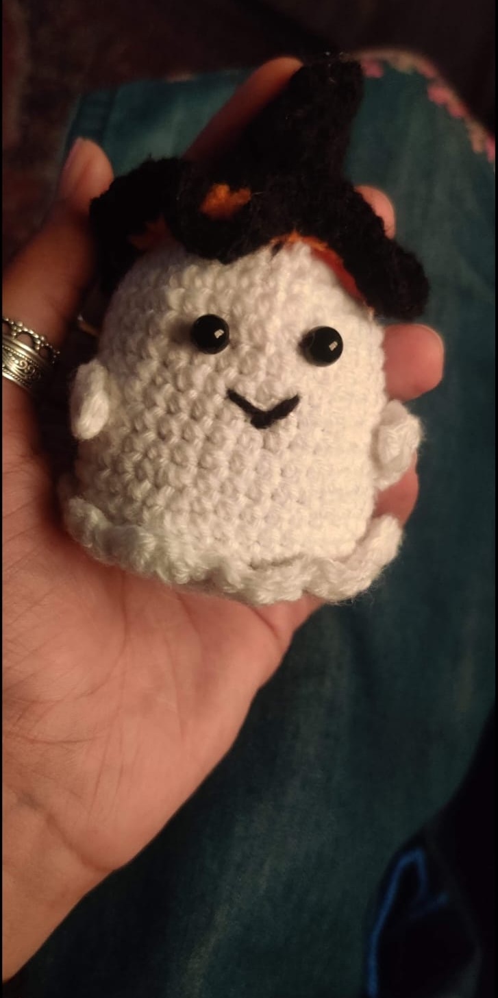 Boo the Witchy Ghost — a white crocheted ghost with a black witch's hat for Halloween