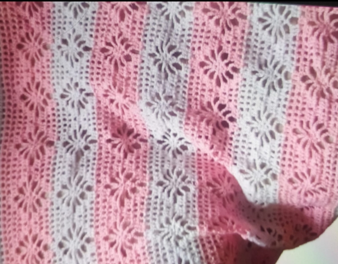 Petal Throw Table Cover — a pink and white crocheted table cover with a delicate floral lace pattern